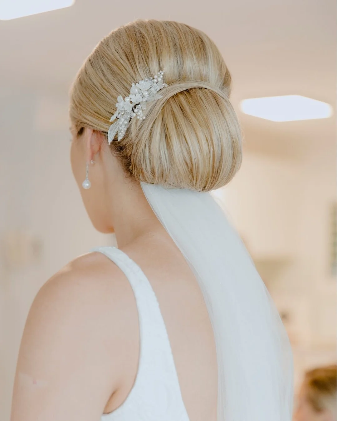 Best-wedding-updo-hairstyles-low-bun-Evalyn-Parsons