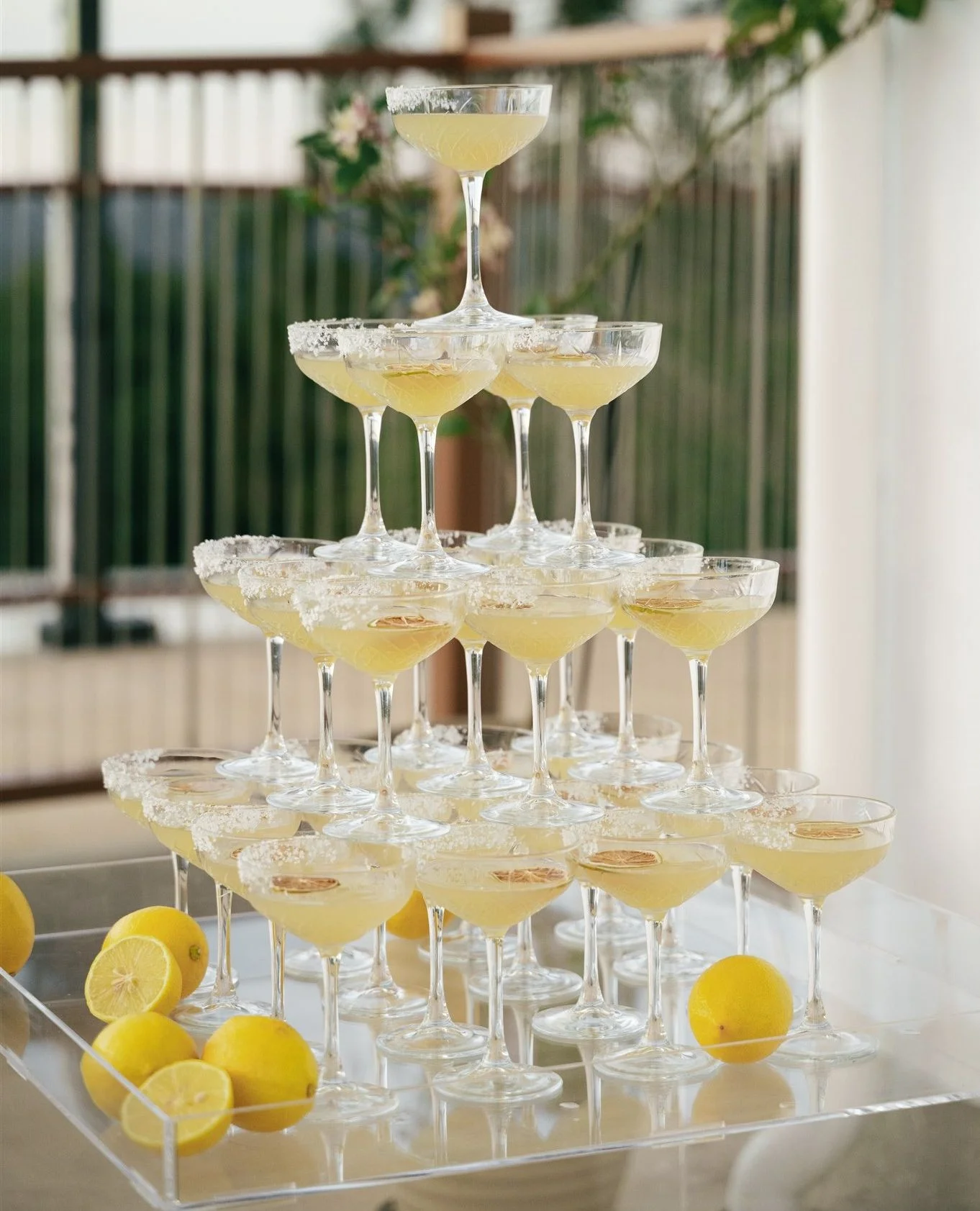 Yellow-wedding-ideas-inspiration-lemoncello-tower-by-The Bartenders-Noosa-photo-@ash_and_stone
