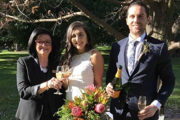 Taylor and Matt enjoying a glass of Veuve in the Autumn leaves of their Wedding. Adelaide Botanic Gardens South Australia.