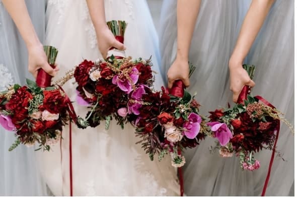 fuchsia and burgundy bouquets
