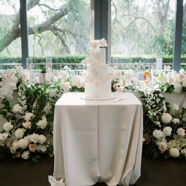 Bridal table flowers and cake table