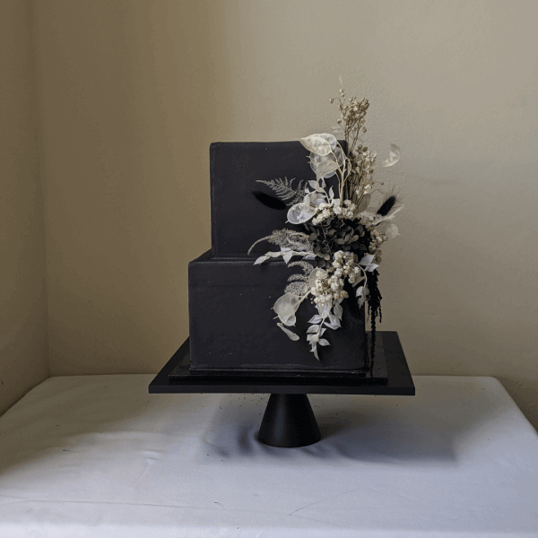 Black dried floral cake