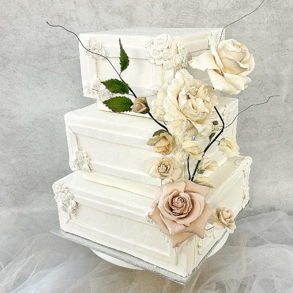 3 tier fondant with sugar florals