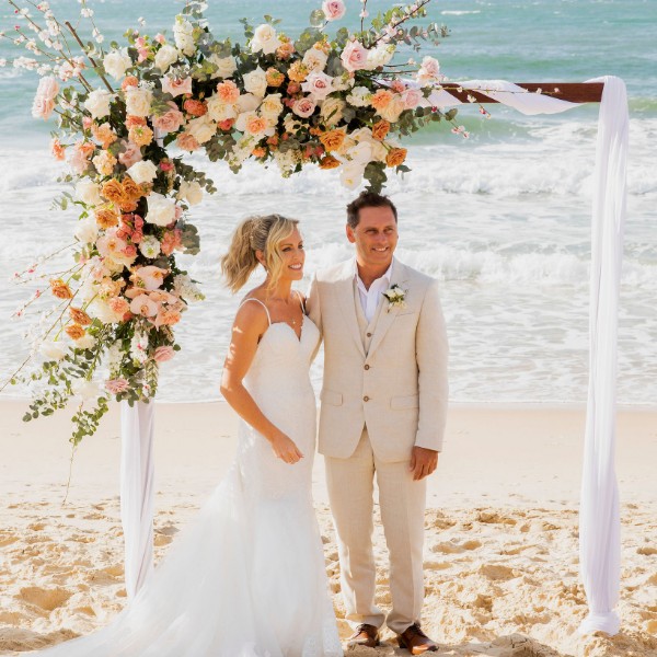 coastal floral arch - Cloud Nine Weddings
