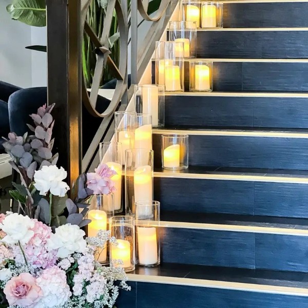 LED Candles and Vases lining the stairs at James Said