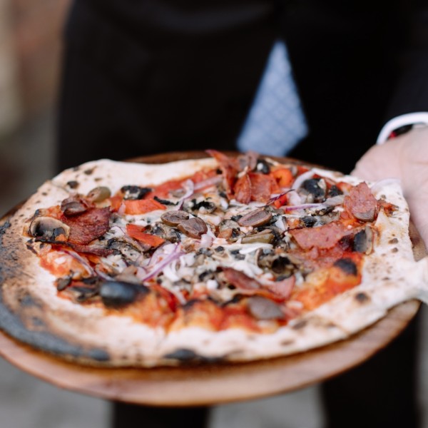 Delicious fresh pizza by Happy Camper Pizza