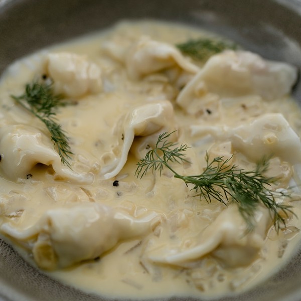 Prawn & Crab Ravioli w/ champagne beurre blanc.