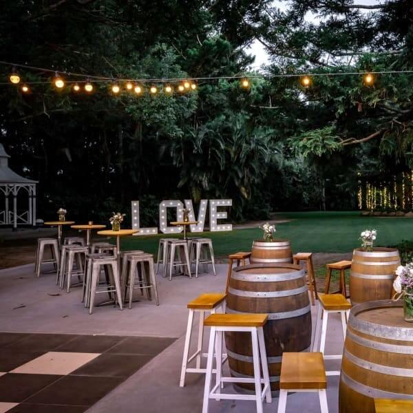 Drinks around barrels in the gardens