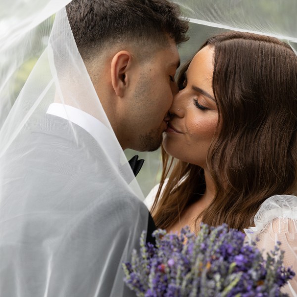 Couple under veil - Veale Gardens Adelaide