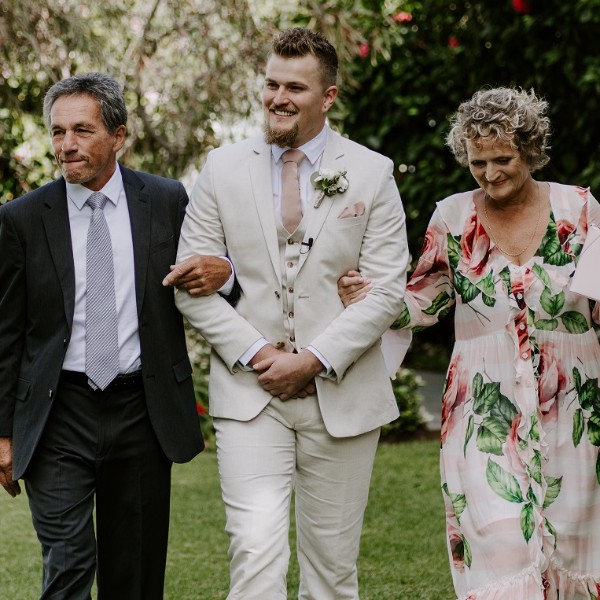 Our Grooms can make an entrace too!  Kelly Mossop did a great job of capturing how proud Mum and Dad were!