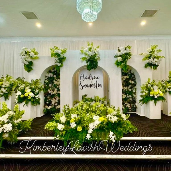 Stage backdrop with lush floral and foliage