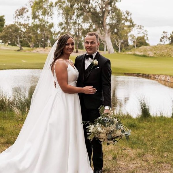 Bride and groom at lake