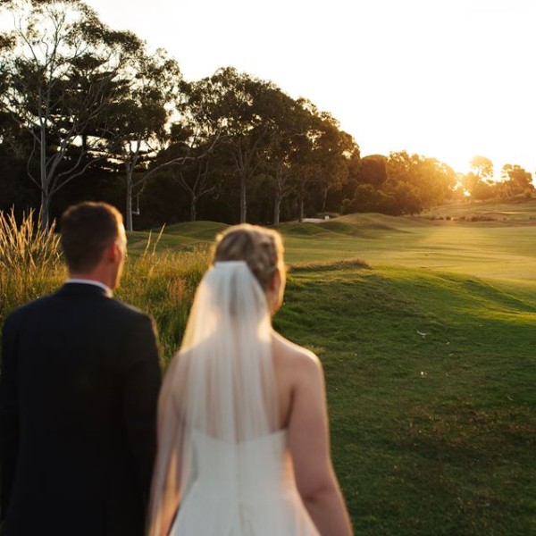 Bride and groom at sunset