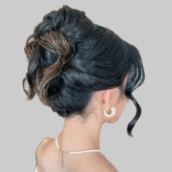 Messy high updo hair