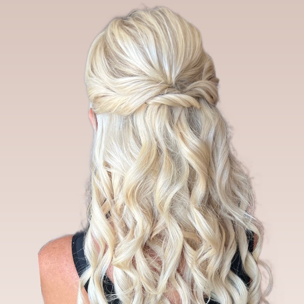 Texturised voluminous half up half down