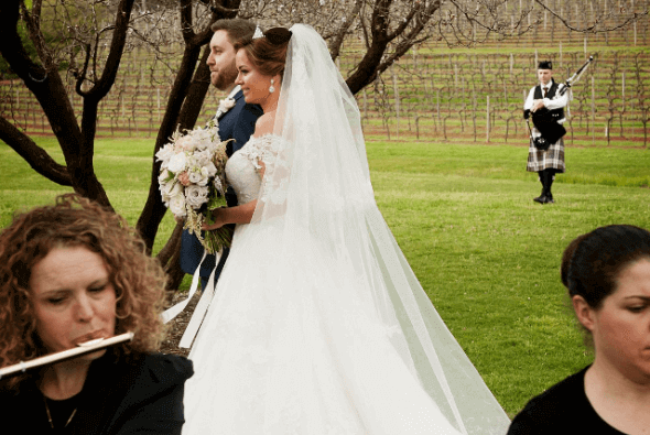 Beck & Amber performing for a bride's entrance, by Stephen Blakeney Photography.