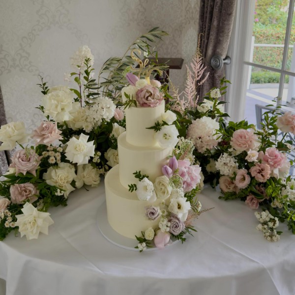 Cake Table Flowers, cake meadow of reflexed roses, astilbe, hydrangea, lisianthus, whimsical, Lillypad Flowers