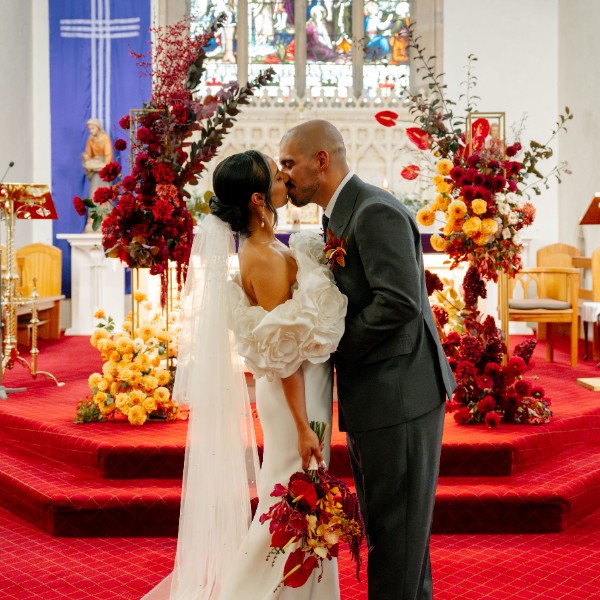 Wedding at St Johns, bold ceremony flower stands. Smokebush, dahlias, anthuriums, refelexed roses, orchids, amaranthus. Lillypad Flowers