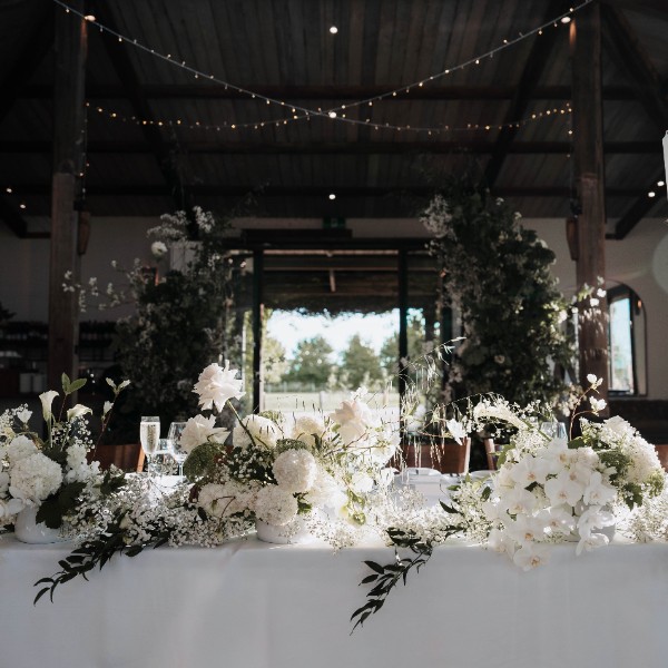 Bridal table flowers in green and white