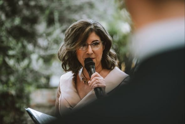 Thoughtful moments will often simply happen during a ceremony ~ captured by Ollie Khedun Photographer