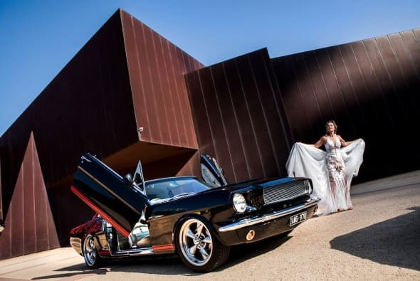 Mustangs in Black 1966 Hartop Mustang Coupe with Lamborghini doors at Malthouse Theatre. Photo by Wedding Shots.