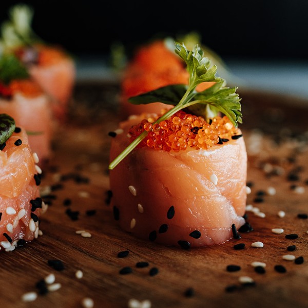 Smoked trout, cream cheese and avocado round with toasted sesame & caviar GF
