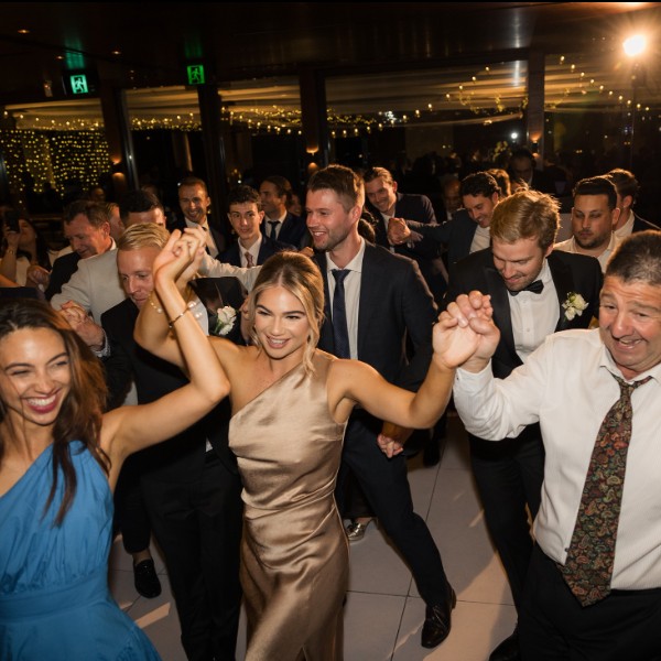 Greek traditional dance called the Kalamatiano Dance enjoyed by all cultures.