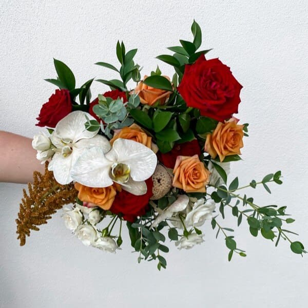 We know how to bouquet! Wild, boho and a pop of colour for this bride