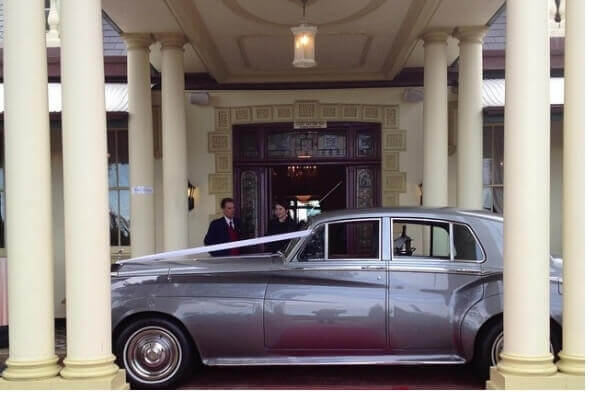 What a timeless image - our Rolls Royce Silver Cloud awaiting the bride & groom