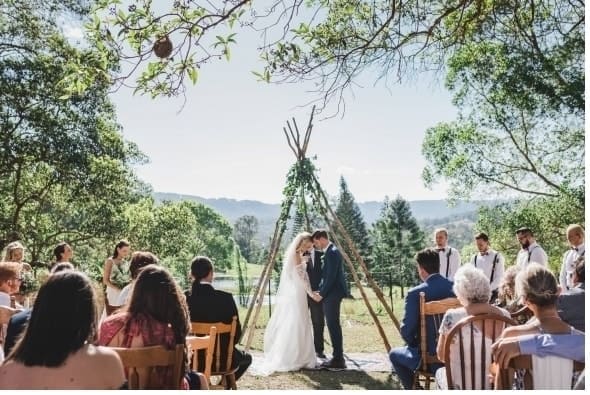 Ceremony with mismatch chairs