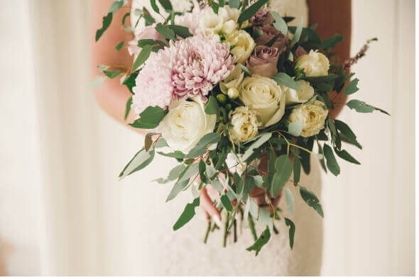 Bride holding wedding bouquet