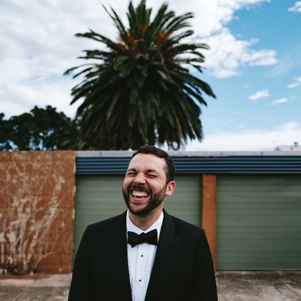 Laughing groom.