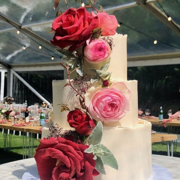 Wedding cake with pink and red roses by SuperEgo Cakes