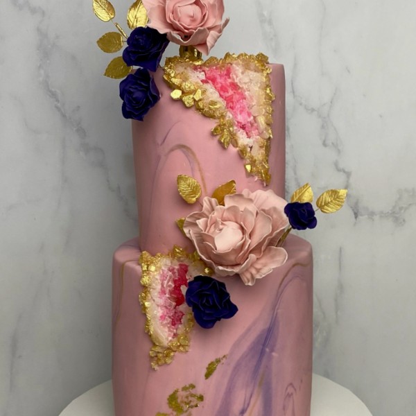 Pink geode cake with fondant flowers