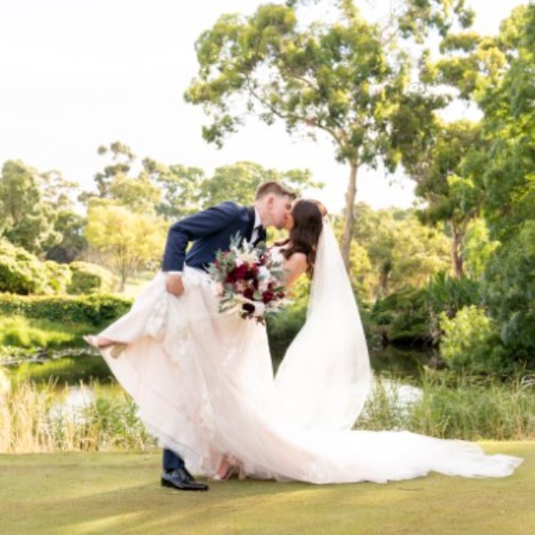 Photos in front of our picturesque lake at Tea Tree Gully Golf Club