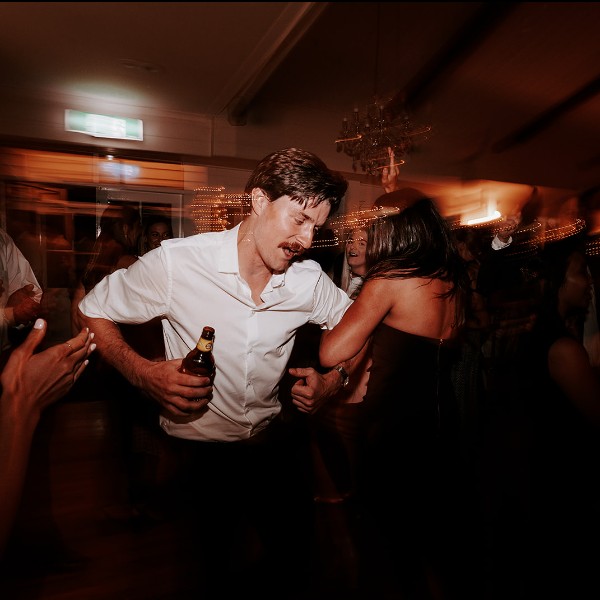 Guests dancing to a Famos DJ at a wedding in Maleny