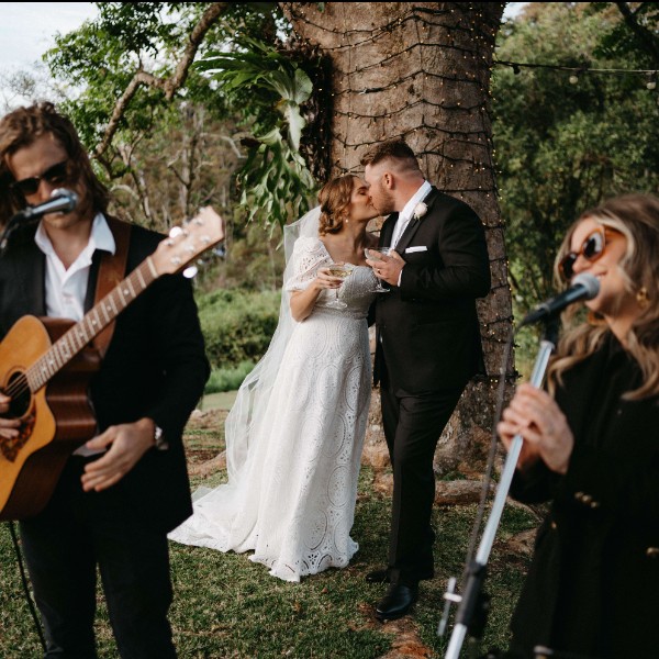 Bec and Oscar sing to newlywed couple who enjoy some alone time at Maleny wedding venue