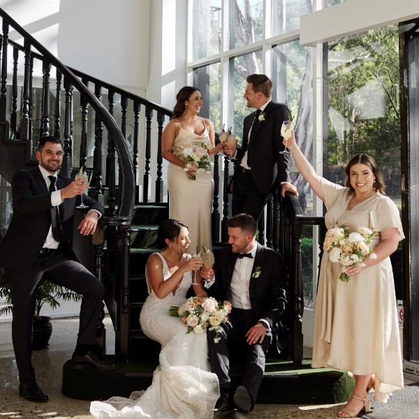 Bridal party on staircase
