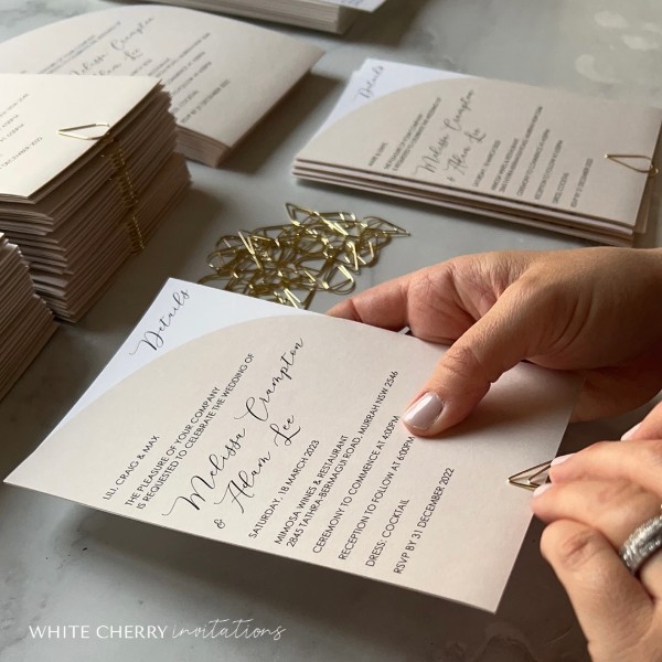 All invitations are assembled. Design: Kaia, Shape: Half Arch, Colours: Almond & Bio Cycle