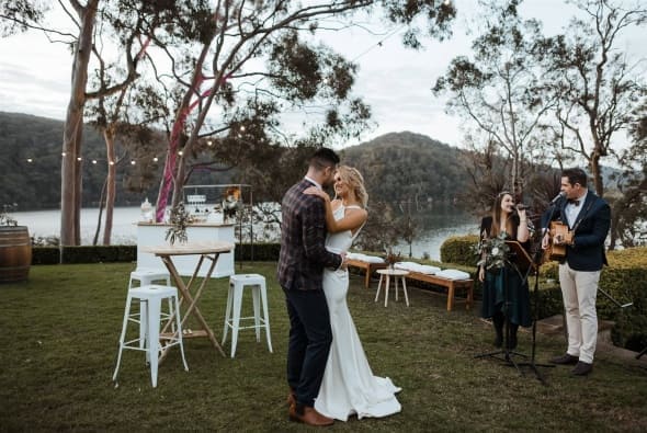 Photo of White Clover Music singing a first dance at Elouera Cottage Point/Kuring-Gai Motor Yacht Club, by Jason Corroto