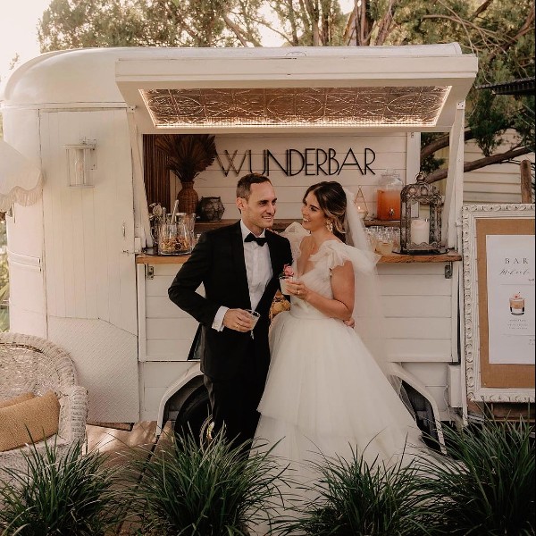 Bride and Groom drinking cocktails - Wunderbar Australia